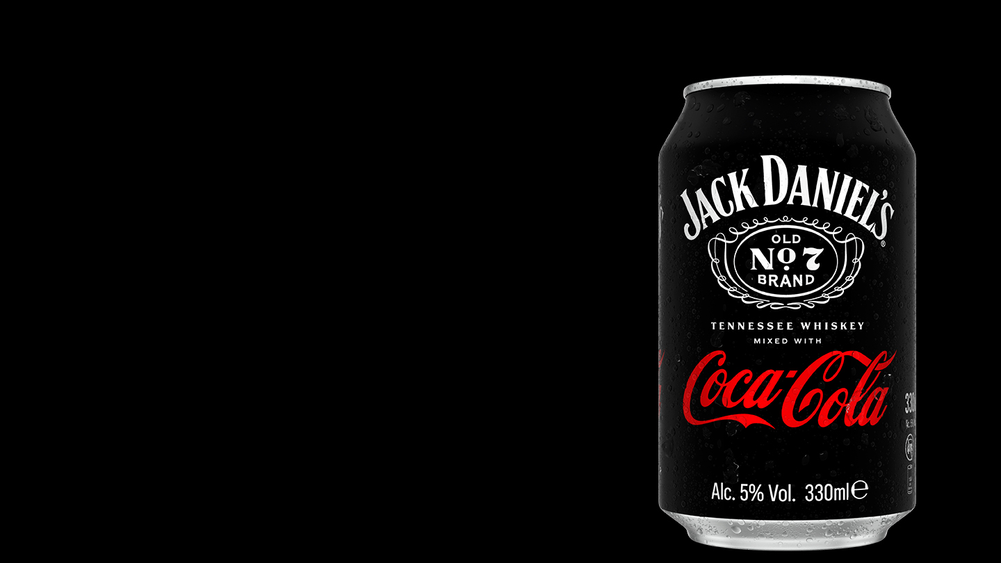 can of jack and coca-cola on a black background